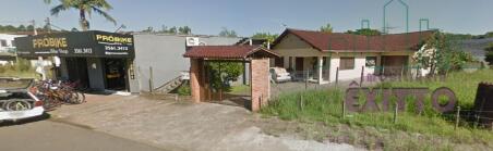 Casa com loja comercial a venda